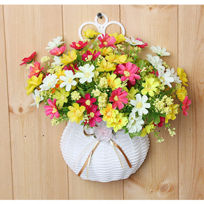 Plastic vase with silk flowers hanging basket