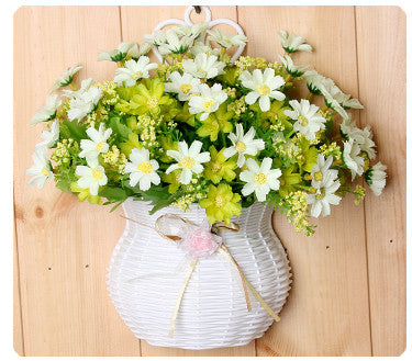 Plastic vase with silk flowers hanging basket