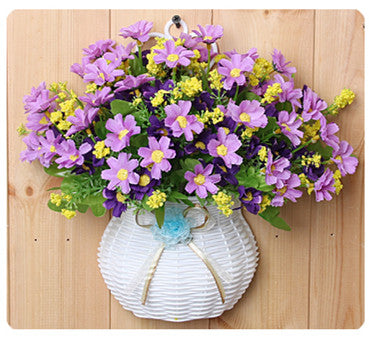 Plastic vase with silk flowers hanging basket