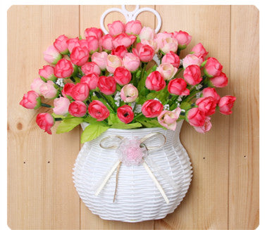 Plastic vase with silk flowers hanging basket