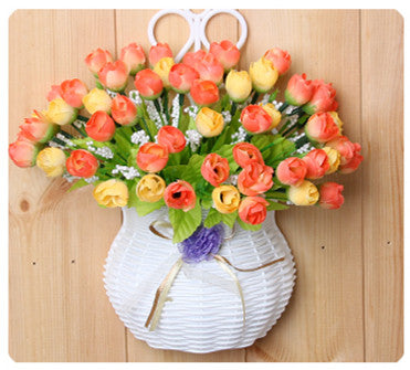 Plastic vase with silk flowers hanging basket