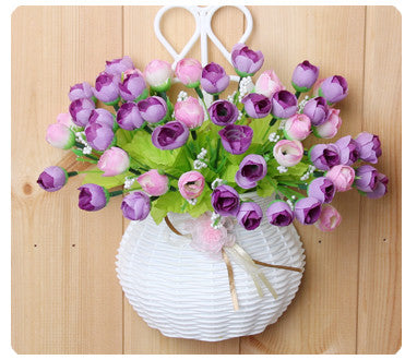 Plastic vase with silk flowers hanging basket