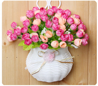 Plastic vase with silk flowers hanging basket